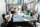 The business meeting starts in the office. Multiracial young adult coworkers interact in conference table. Copy space. Business concept. Start up concept.
